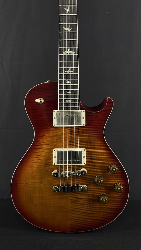 Электрогитара PRS Singlecut McCarty 594 in Dark Cherry Sunburst with 10 Top
Электрогитара PRS Singlecut McCarty 594 in Dark Cherry Sunburst with 10 Top