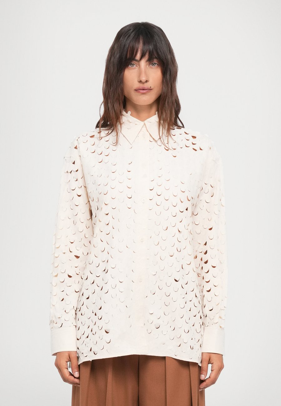 Блуза Nanushka APHEA, Creme/Off-White
Блуза Nanushka APHEA, Creme/Off-White