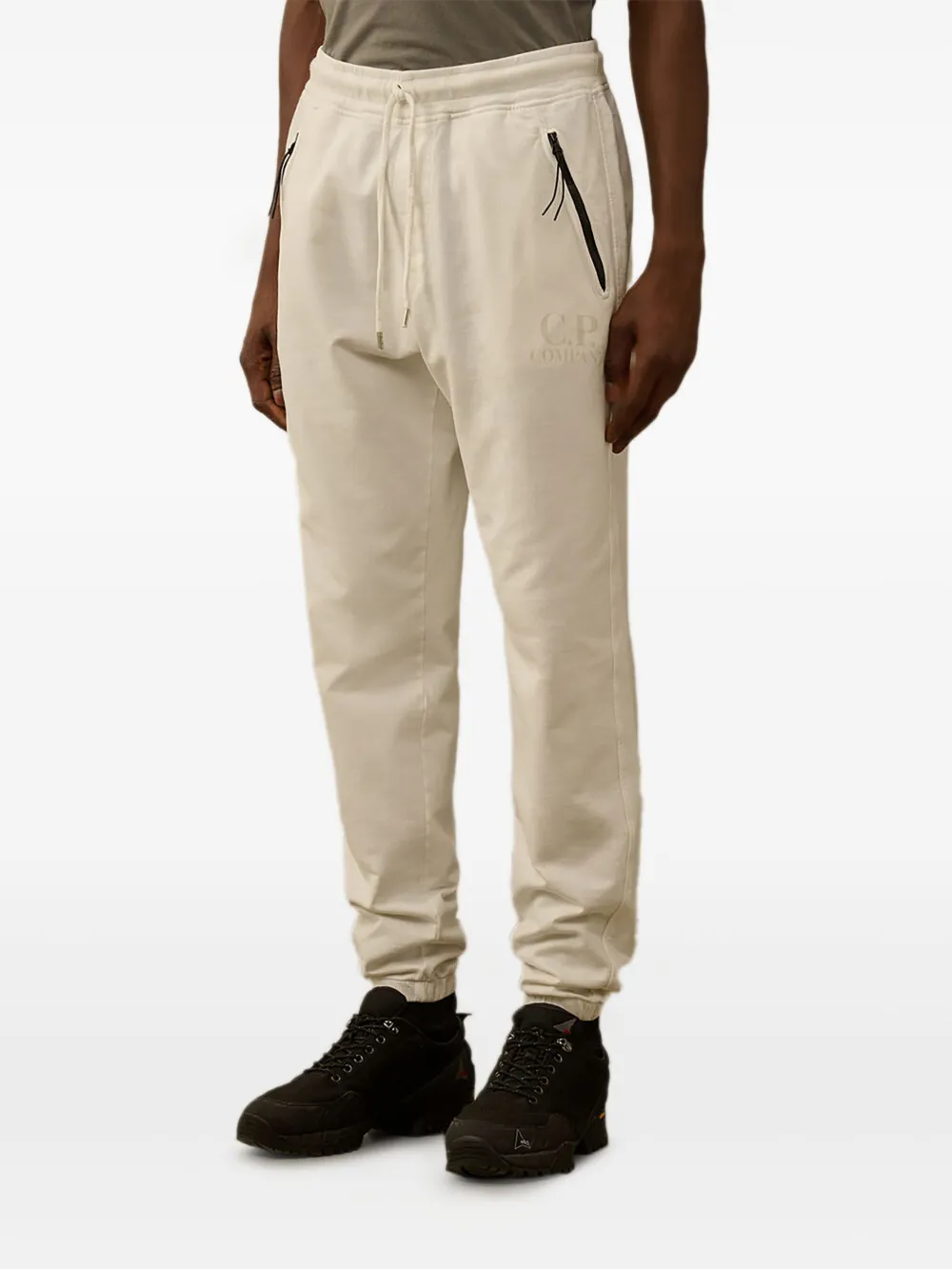 Спортивные брюки с карманом на молнии и шнурком C.P. Company, нейтральный
Спортивные брюки с карманом на молнии и шнурком C.P. Company, нейтральный