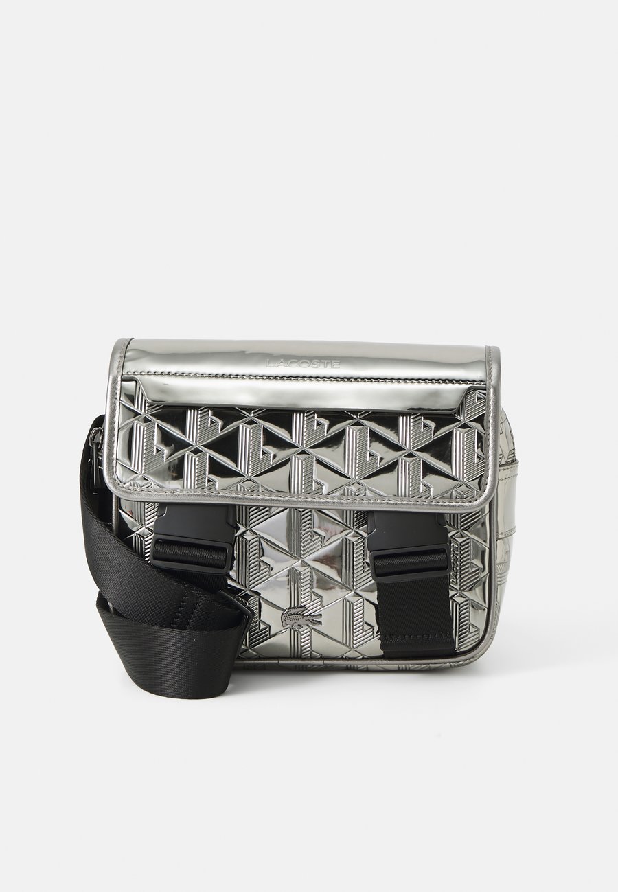 Сумка кросс-боди Lacoste CROSSOVER BAG THE BLEND SEASONAL, Silver/Black/Grey
Сумка кросс-боди Lacoste CROSSOVER BAG THE BLEND SEASONAL, Silver/Black/Grey