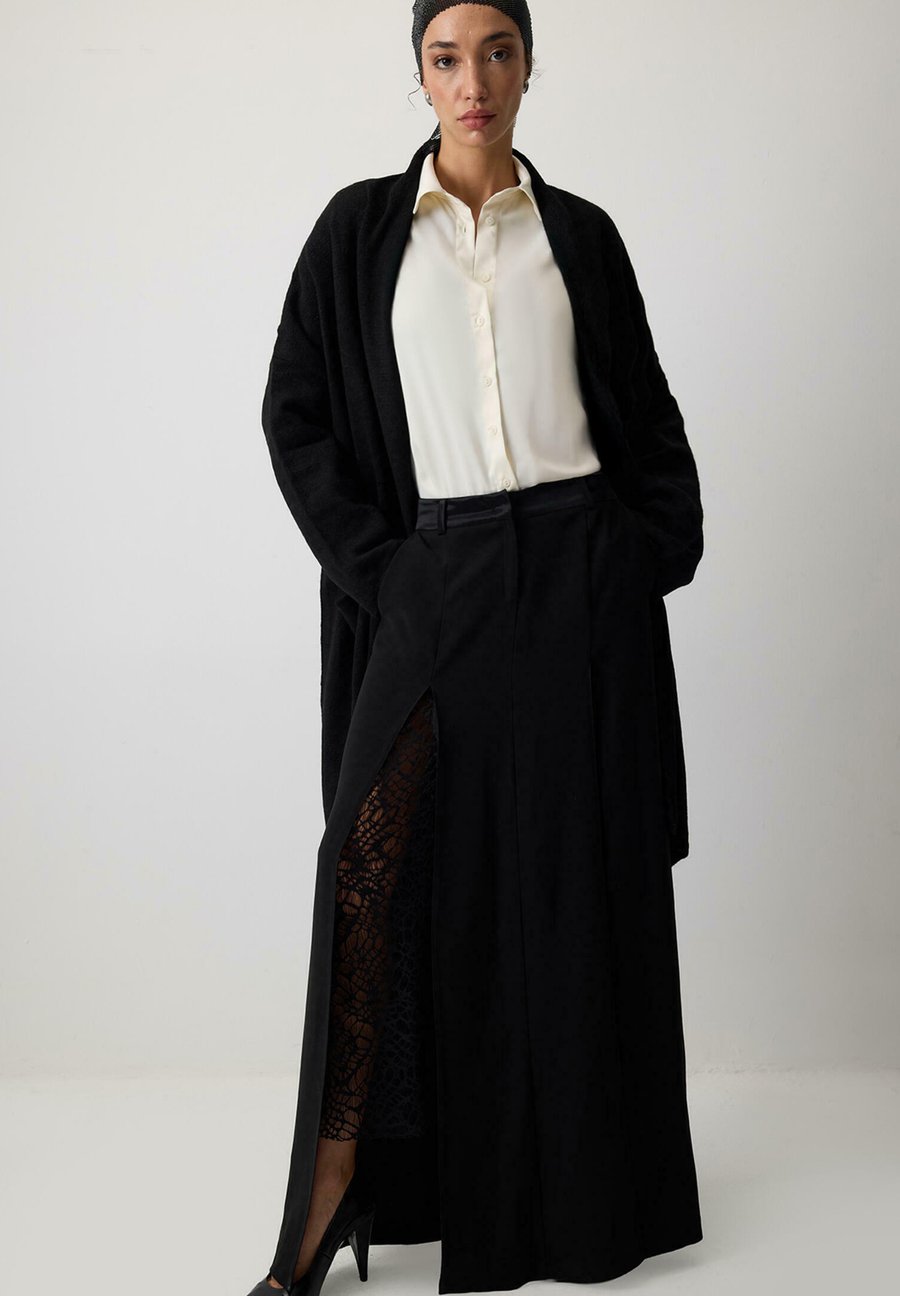 Кардиган Touché Privé Cardigan, Black
Кардиган Touché Privé Cardigan, Black