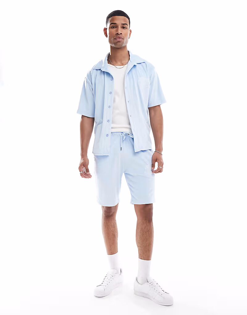 Шорты-поло Criminal Damage синего цвета
Шорты-поло Criminal Damage синего цвета