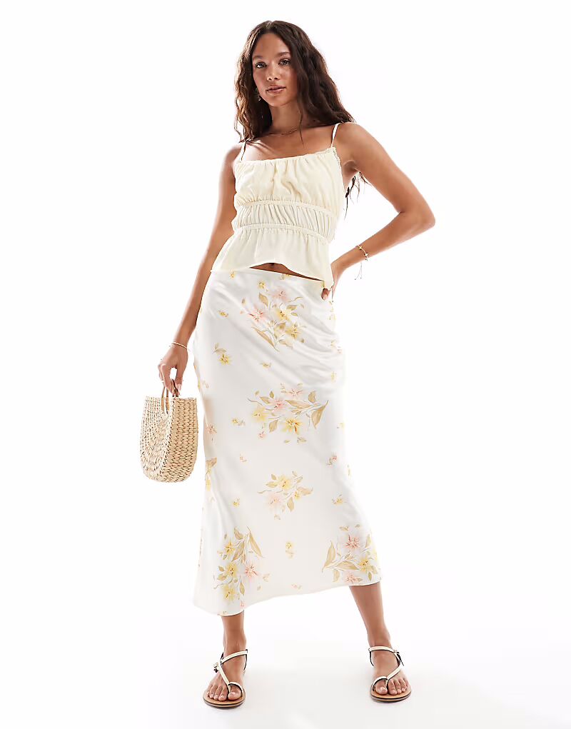 Юбка миди New Look из атласа с косой тесьмой и желтым цветочным узором
Юбка миди New Look из атласа с косой тесьмой и желтым цветочным узором