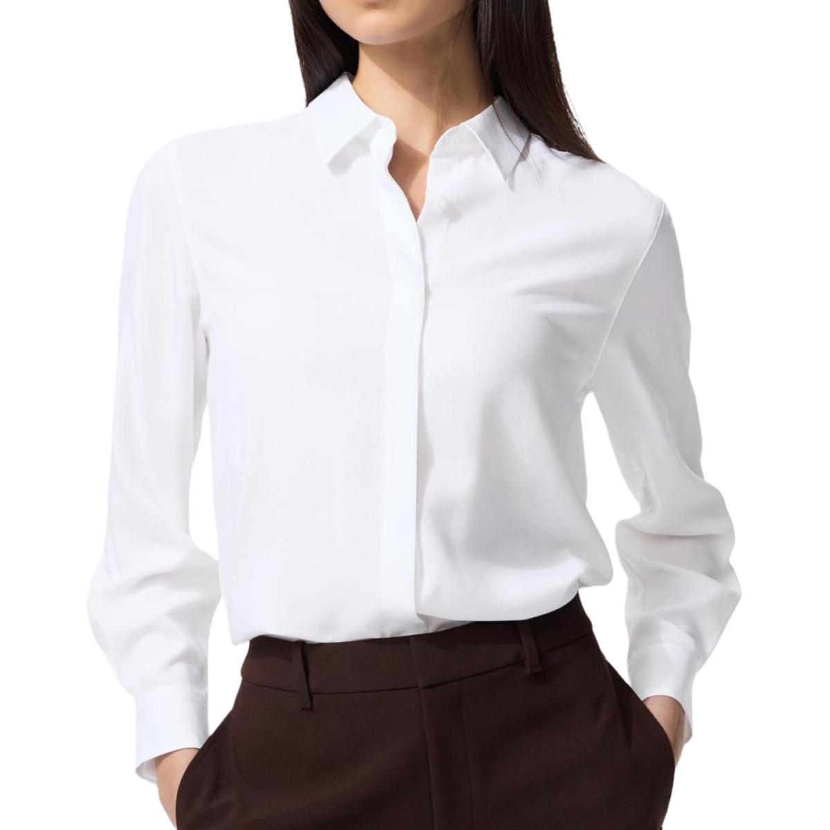 UNIQLO Женская белая рубашка
UNIQLO Женская белая рубашка