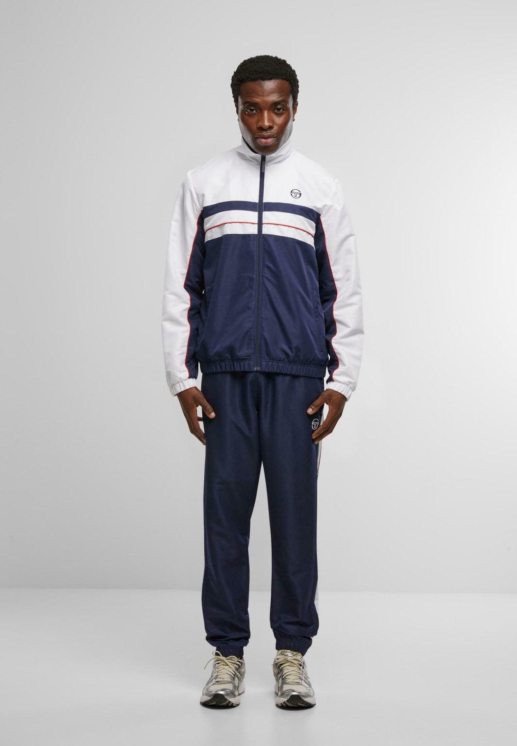 Спортивный костюм ZELMA 025 Sergio Tacchini, темно-синий
Спортивный костюм ZELMA 025 Sergio Tacchini, темно-синий