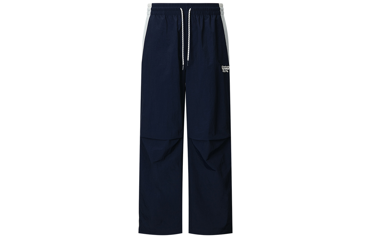 Повседневные брюки унисекс темно-синие Reebok
Повседневные брюки унисекс темно-синие Reebok