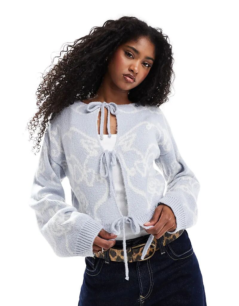 Вязаный кардиган с завязками спереди в синий принт ASOS DESIGN 
Вязаный кардиган с завязками спереди в синий принт ASOS DESIGN