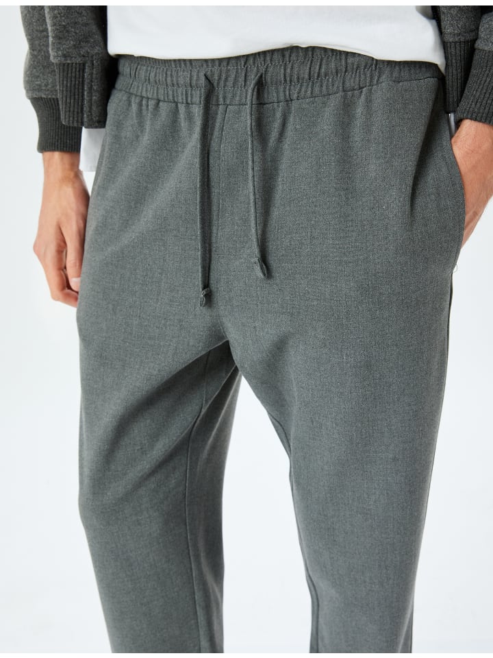 Брюки темно-синего цвета KOTON
Брюки темно-синего цвета KOTON