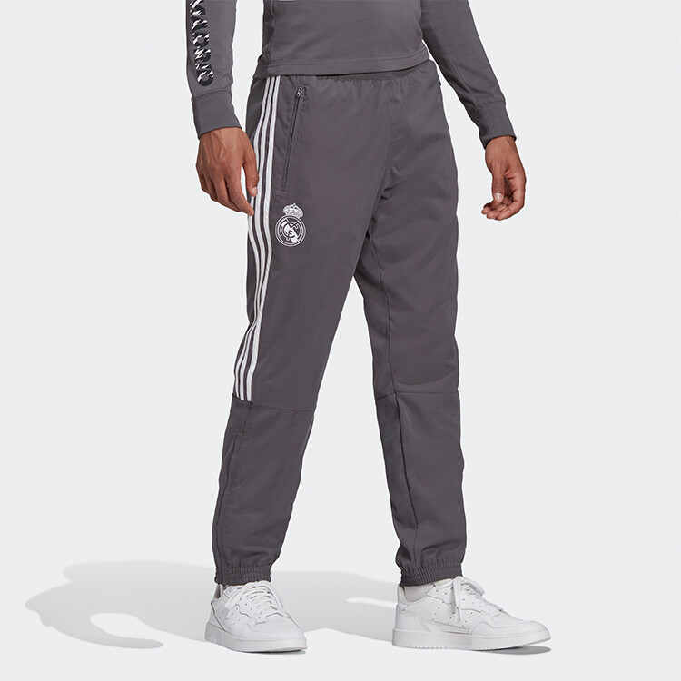 Трикотажные спортивные штаны Real Madrid CF для мужчин светло-серого цвета Adidas, серый
Трикотажные спортивные штаны Real Madrid CF для мужчин светло-серого цвета Adidas, серый