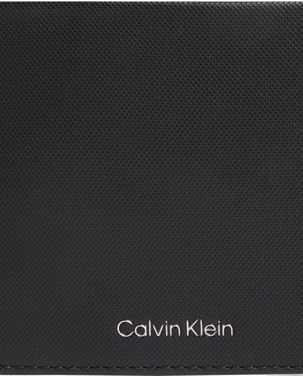 Кожаное тройное портмоне Calvin Klein, черный
Кожаное тройное портмоне Calvin Klein, черный