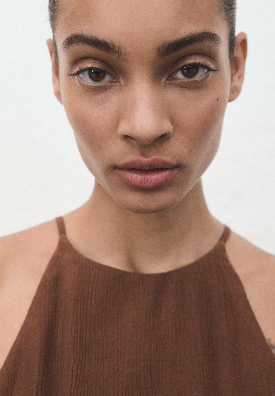 Комбинезон Mango GEPLOOIDE MET CEINTUUR, Bruin/Brown
Комбинезон Mango GEPLOOIDE MET CEINTUUR, Bruin/Brown