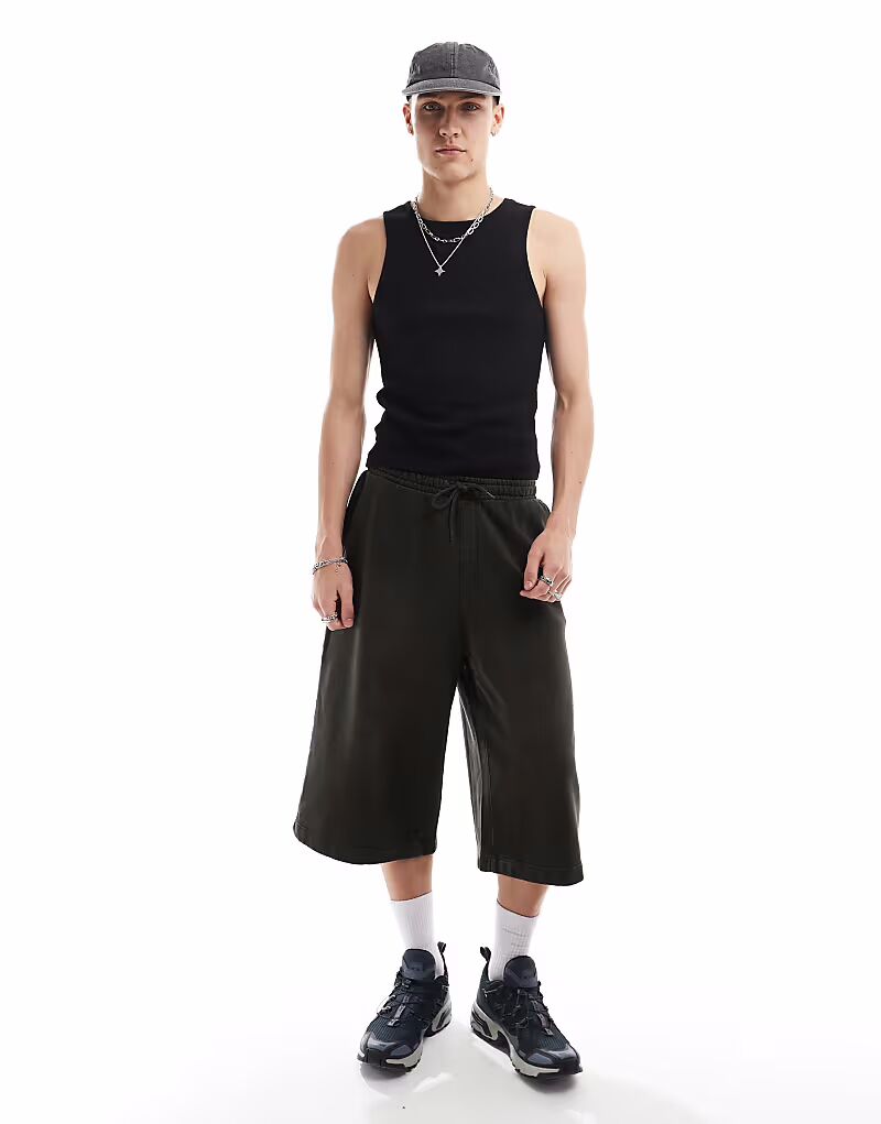 Майка в рубчик черного цвета Collusion
Майка в рубчик черного цвета Collusion