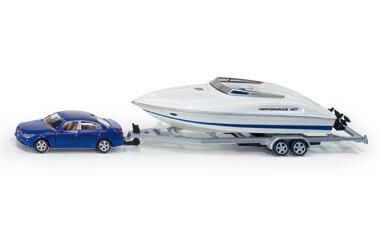 Сику, модель автомобиля с моторной лодкой Siku
Сику, модель автомобиля с моторной лодкой Siku