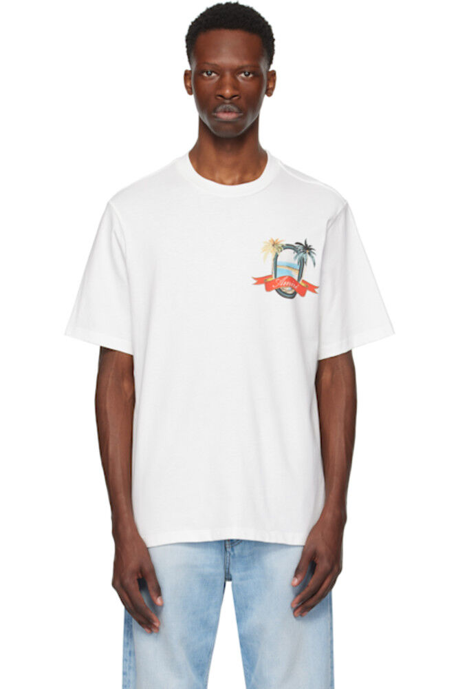 Белая футболка «AMIRI Paradise»
Белая футболка «AMIRI Paradise»