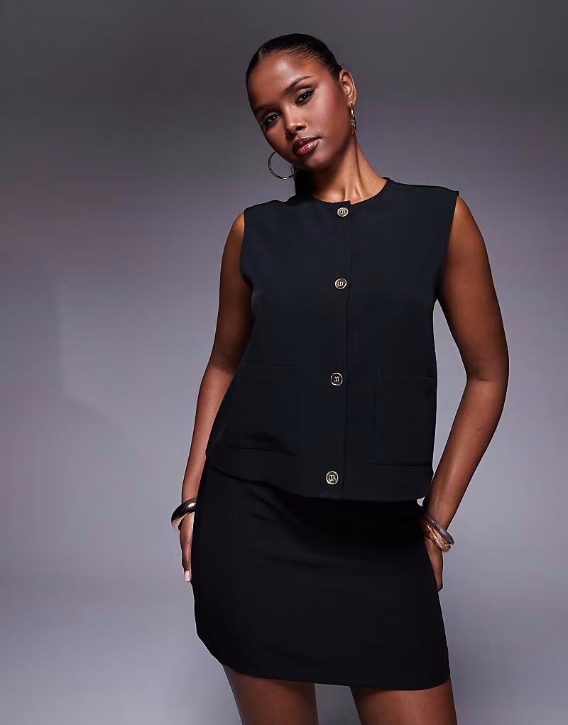 Жилет свободного кроя ASOS DESIGN черного цвета с золотыми пуговицами
Жилет свободного кроя ASOS DESIGN черного цвета с золотыми пуговицами