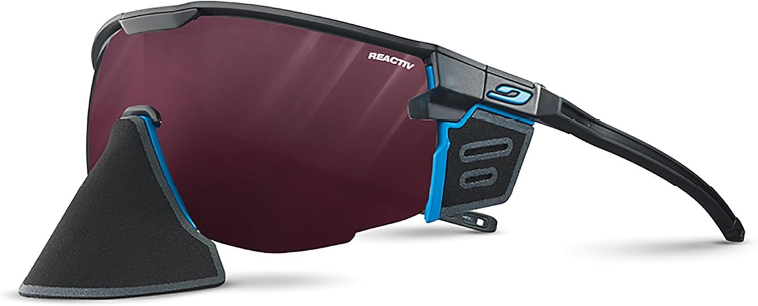 Очки Julbo Ultimate Cover Glacier для мужчин и женщин со съемными боковыми и носовыми щитками для походов и сноубординга - 100% защита от УФ-излучения, Black / Blue Frame - Transparent / Rose Lens (Reactiv 0-4 High Contrast)
Очки Julbo Ultimate Cover Glacier для мужчин и женщин со съемными боковыми и носовыми щитками для походов и сноубординга - 100% защита от УФ-излучения, Black / Blue Frame - Transparent / Rose Lens (Reactiv 0-4 High Contrast)