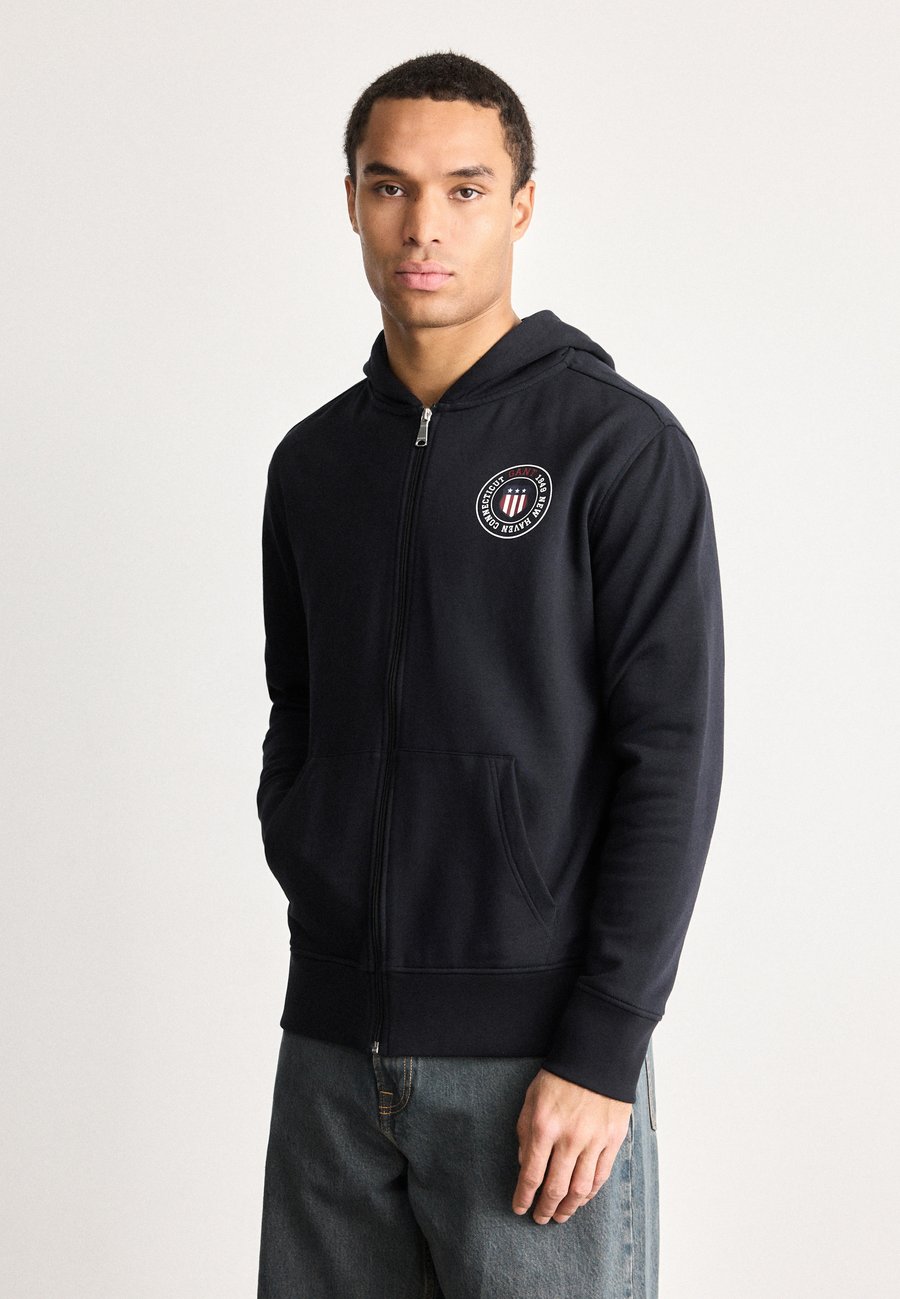 Толстовка GANT GRAPHIC FULL ZIP HOODIE, Black
Толстовка GANT GRAPHIC FULL ZIP HOODIE, Black