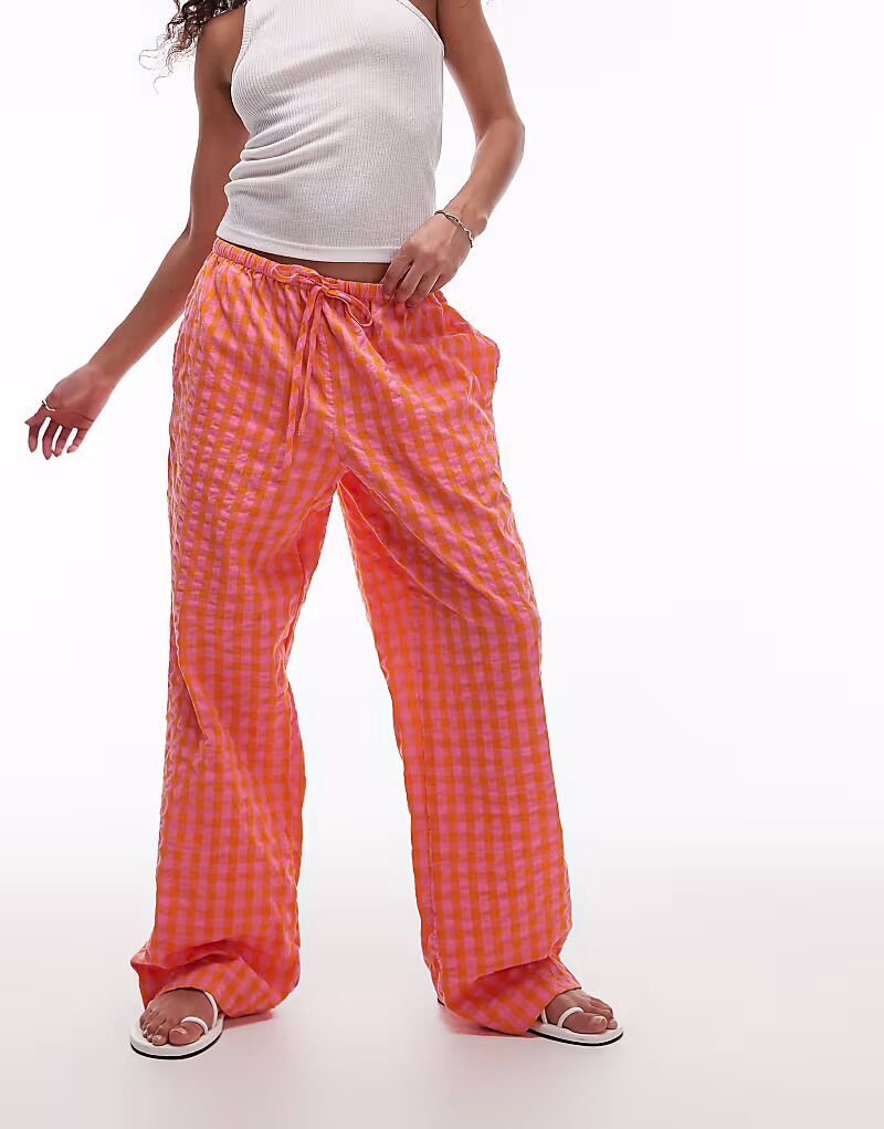 Брюки в оранжевую клетку Topshop, надеваемые вручную, оранжевого цвета
Брюки в оранжевую клетку Topshop, надеваемые вручную, оранжевого цвета