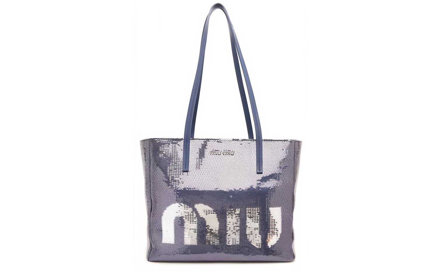 Сумка-шоппер MIU MIU женская серая с кожаными вставками и пайетками
Сумка-шоппер MIU MIU женская серая с кожаными вставками и пайетками