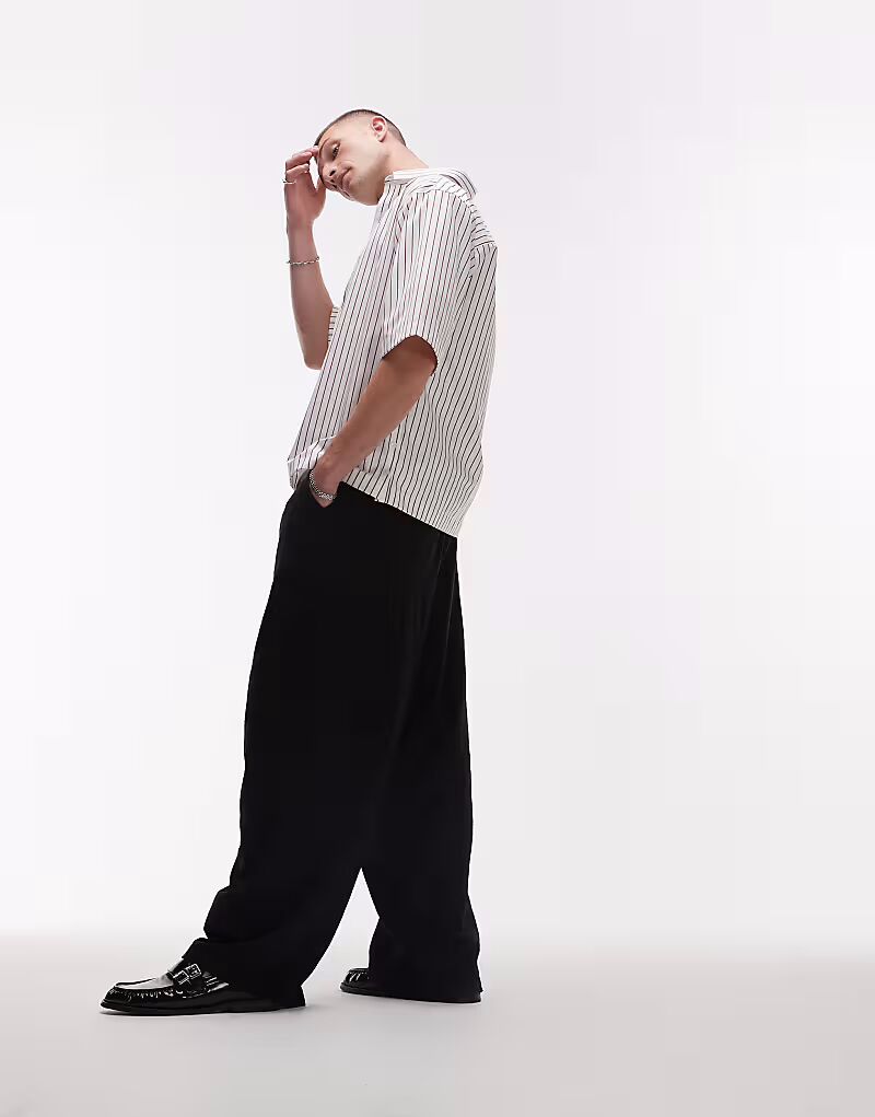 Повседневные брюки Topman из льняной смеси свободного кроя черного цвета
Повседневные брюки Topman из льняной смеси свободного кроя черного цвета