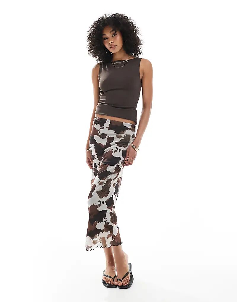 Юбка миди с принтом коровы New Look черного цвета
Юбка миди с принтом коровы New Look черного цвета