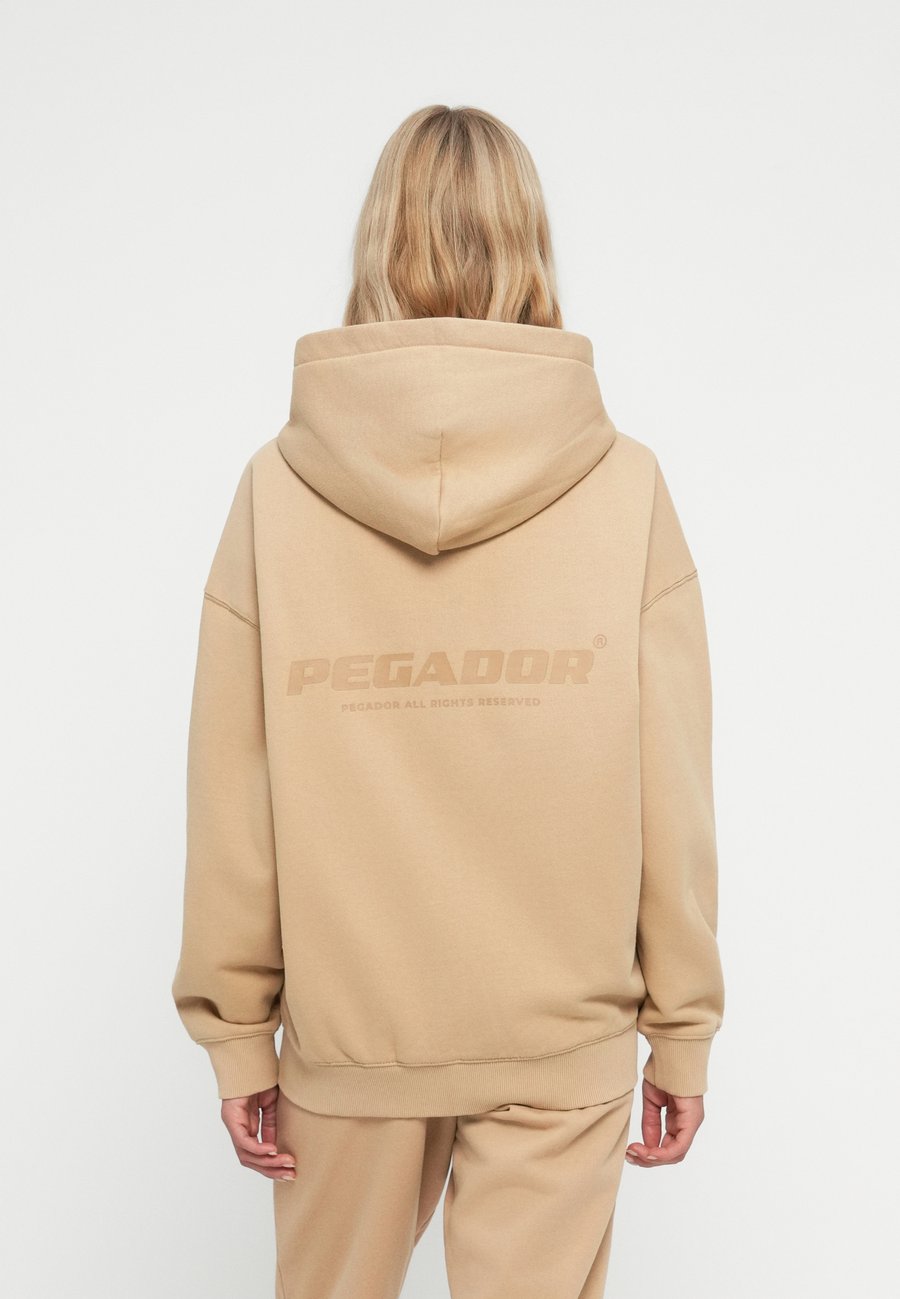 Толстовка Pegador RAMIRA OVERSIZED JACKET, Washed Cappuccino/Brown
Толстовка Pegador RAMIRA OVERSIZED JACKET, Washed Cappuccino/Brown