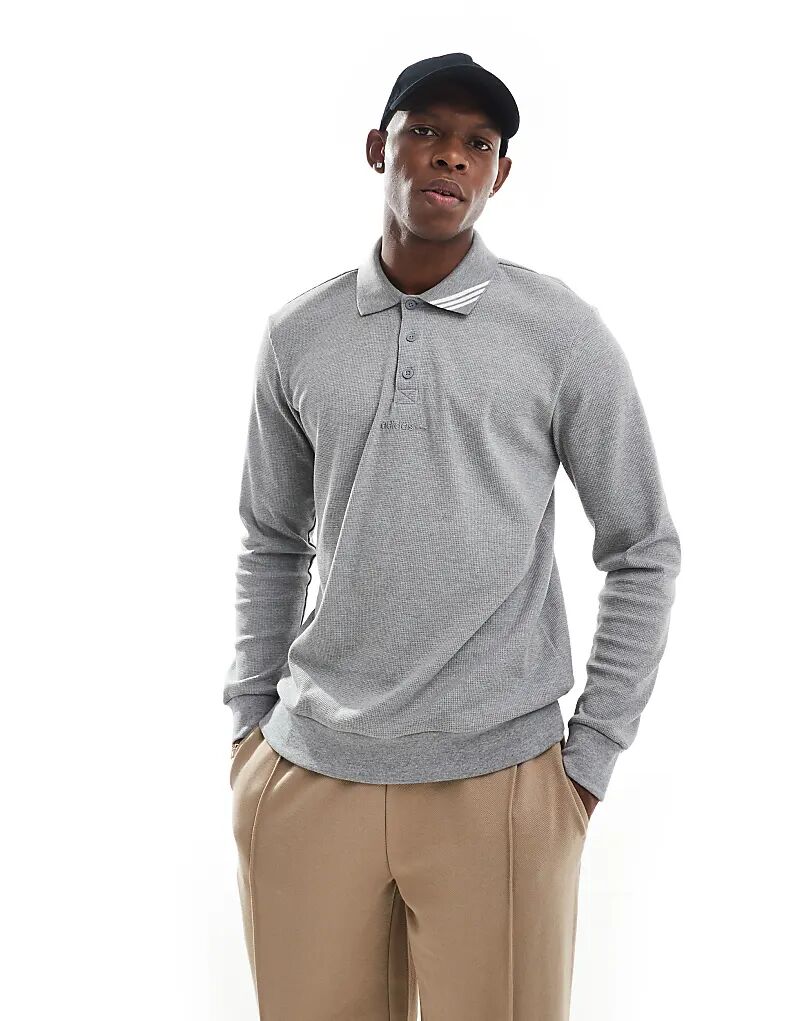 Поло с длинными рукавами из меланжевого цвета adidas Originals
Поло с длинными рукавами из меланжевого цвета adidas Originals