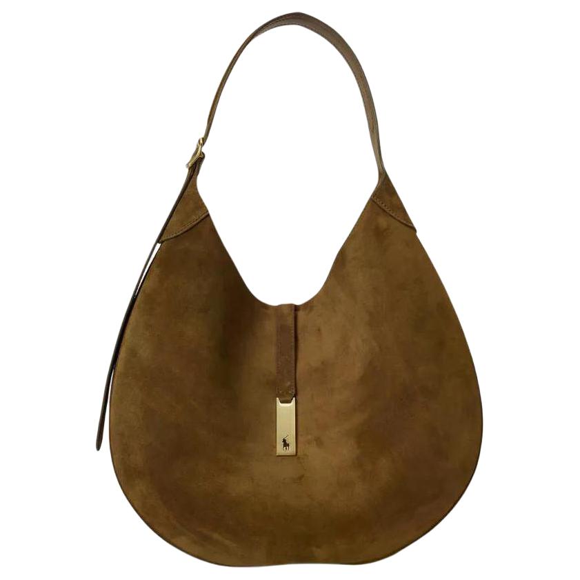 Сумка через плечо с крупной бляшкой-логотипом Polo Ralph Lauren, basic set (bag+dust bag)
Сумка через плечо с крупной бляшкой-логотипом Polo Ralph Lauren, basic set (bag+dust bag)