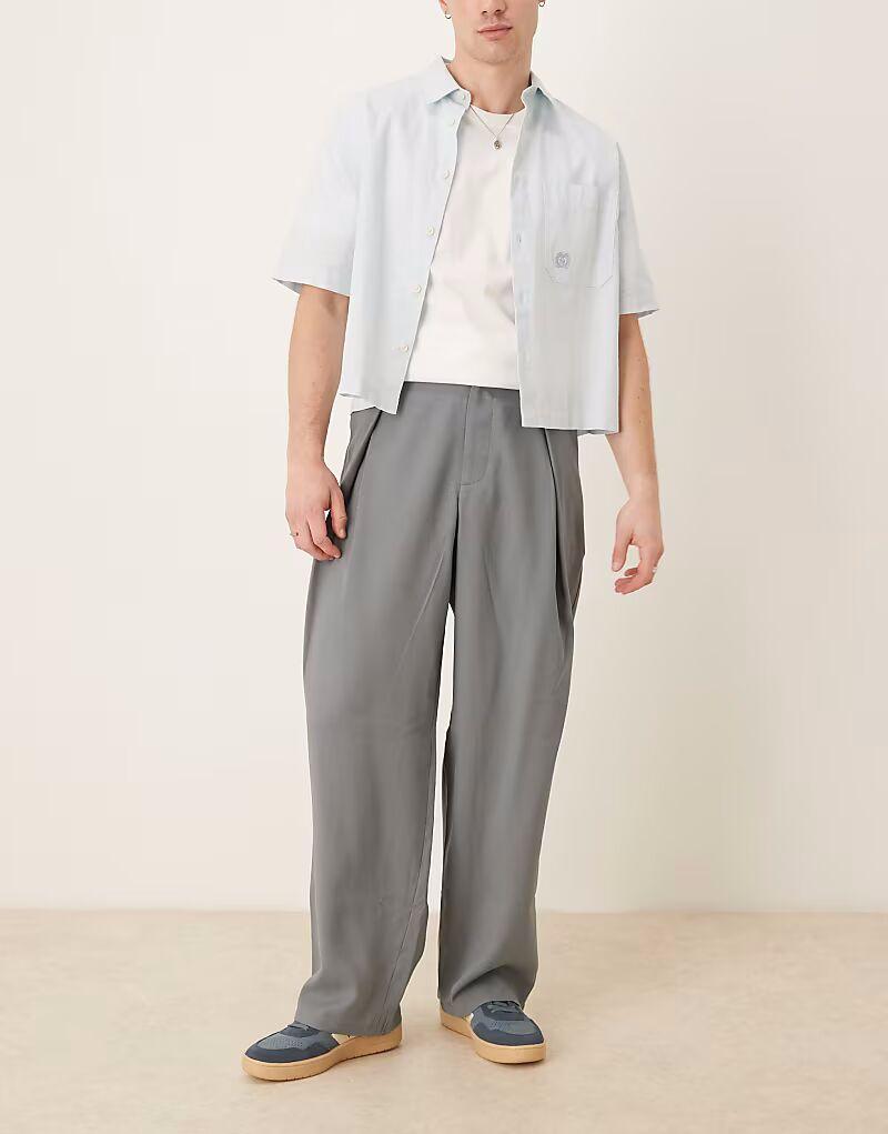 Широкие элегантные брюки ASOS DESIGN со складками серого цвета
Широкие элегантные брюки ASOS DESIGN со складками серого цвета