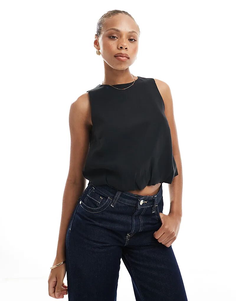 Укороченный топ с подолом-пузырьком ONLY черного цвета
Укороченный топ с подолом-пузырьком ONLY черного цвета