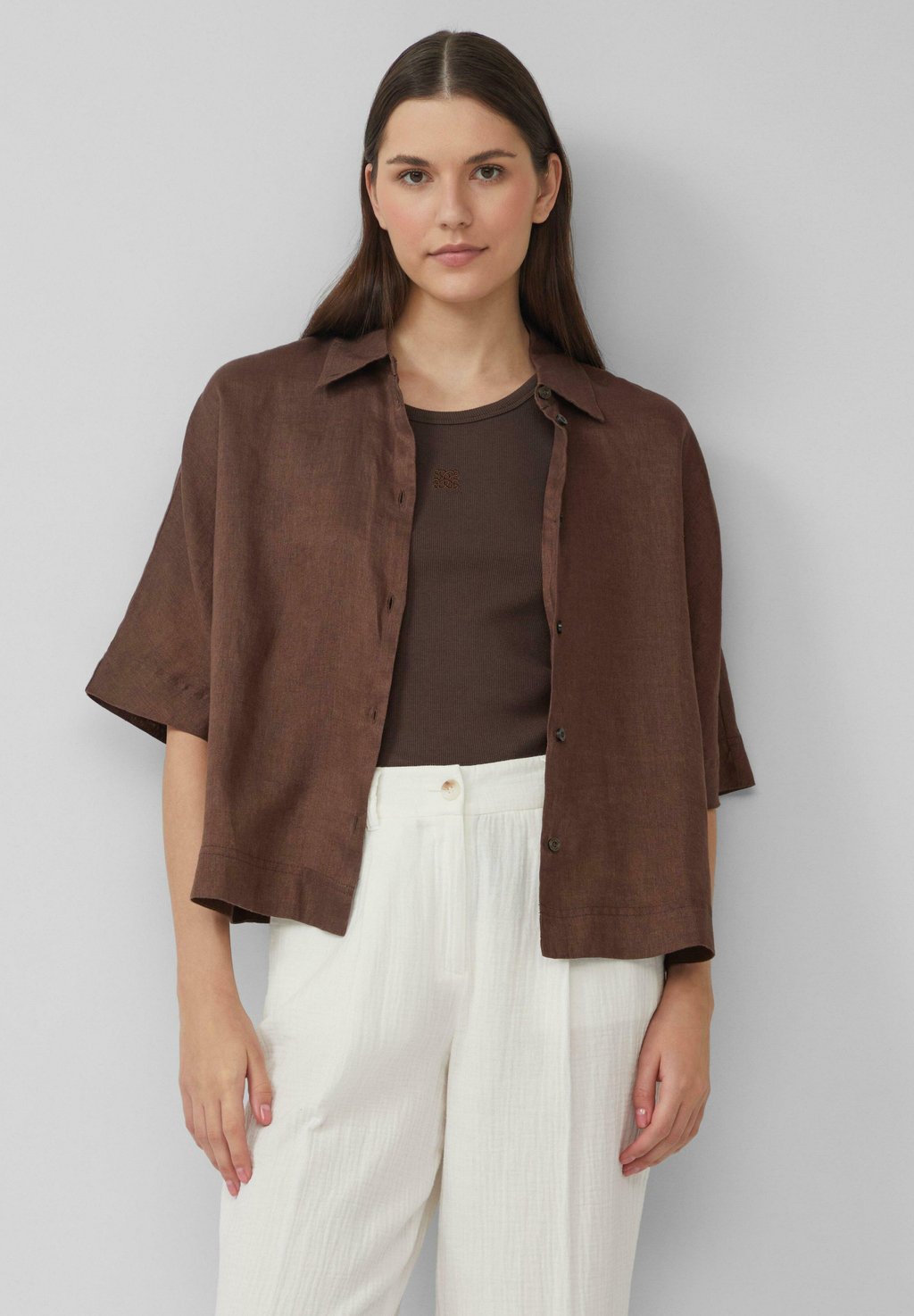 Блузка на пуговицах s.Oliver, темно-коричневый
Блузка на пуговицах s.Oliver, темно-коричневый