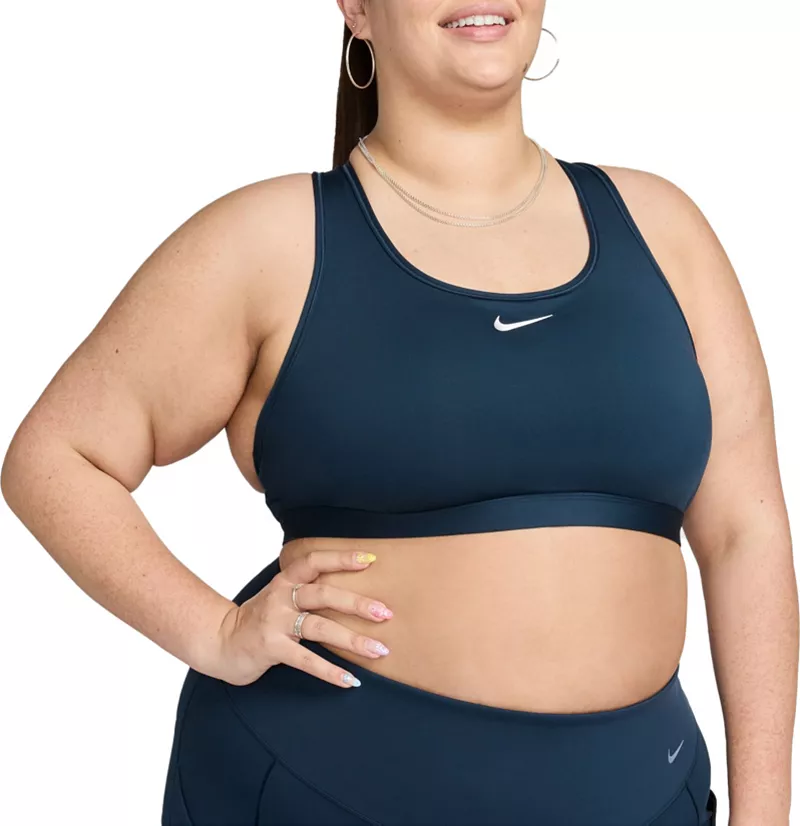 Женский спортивный бюстгальтер с мягкой подкладкой средней поддержки Nike Swoosh (большие размеры), цвет Armory Navy
Женский спортивный бюстгальтер с мягкой подкладкой средней поддержки Nike Swoosh (большие размеры), цвет Armory Navy