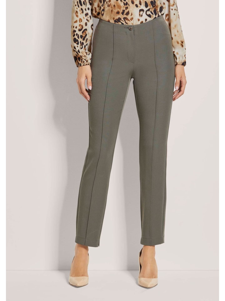 MADELEINE Узкие эластичные брюки цвета хаки со складками
MADELEINE Узкие эластичные брюки цвета хаки со складками