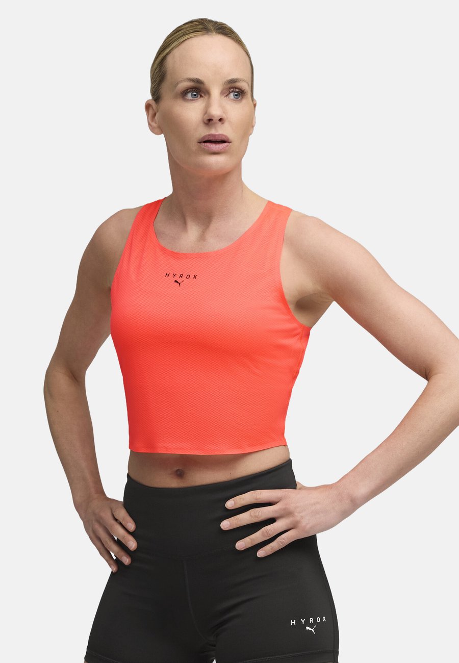 Топ Puma HYROX ULTRASPUN CROP, Glowing Red/Red
Топ Puma HYROX ULTRASPUN CROP, Glowing Red/Red