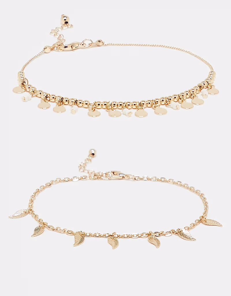 Набор из 2 браслетов на ногу с рисунком листьев и подвесок в золотистом цвете Asos Design
Набор из 2 браслетов на ногу с рисунком листьев и подвесок в золотистом цвете Asos Design