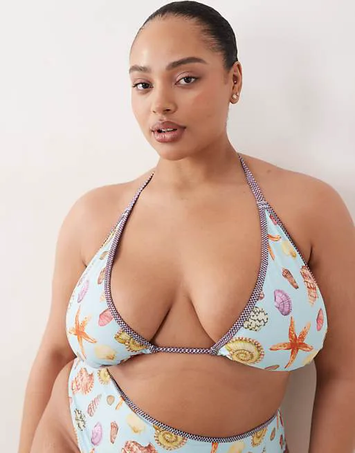 Синий бикини-топ с треугольными чашечками и высоким верхом ASOS DESIGN Curve Solar Starfish
Синий бикини-топ с треугольными чашечками и высоким верхом ASOS DESIGN Curve Solar Starfish