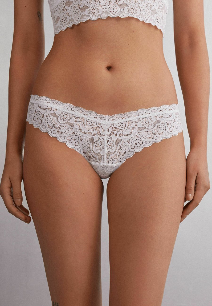 Трусы Intimissimi Thong, White
Трусы Intimissimi Thong, White