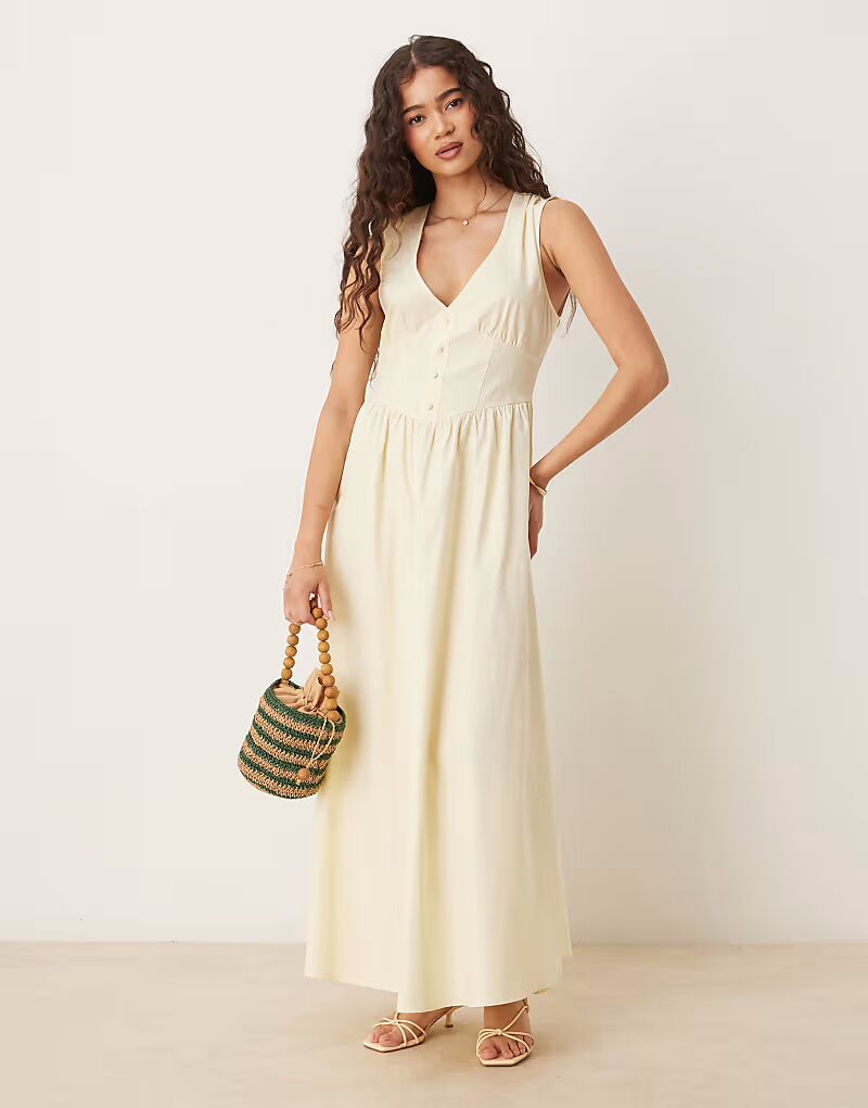 Платье миди на пуговицах с v-образным вырезом и талией ASOS DESIGN цвета пахты
Платье миди на пуговицах с v-образным вырезом и талией ASOS DESIGN цвета пахты