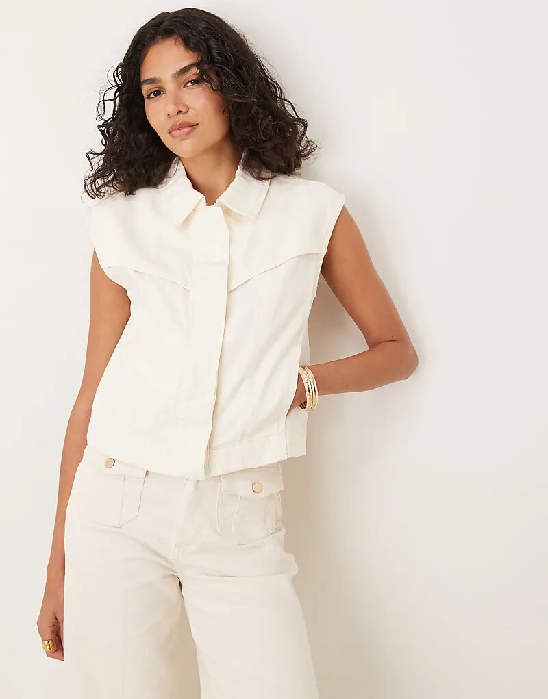 Жилет Mango свободного кроя в стиле вестерн без рукавов с потайной застежкой на пуговицы бежевого цвета
Жилет Mango свободного кроя в стиле вестерн без рукавов с потайной застежкой на пуговицы бежевого цвета