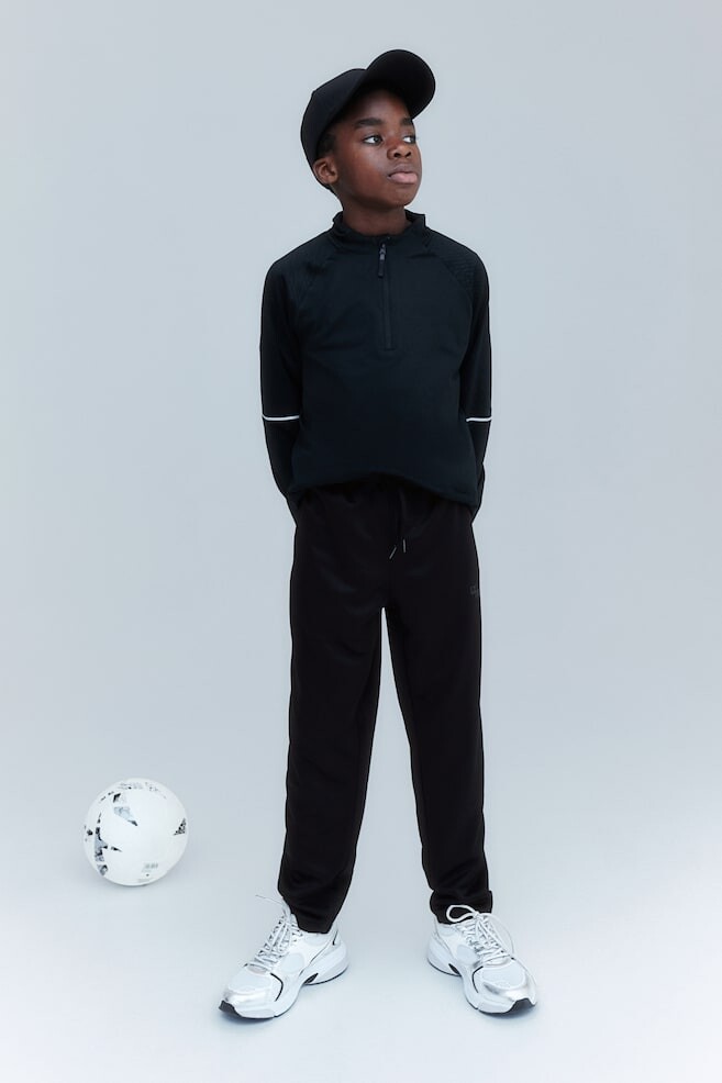 Комплект из 2 тренировочных брюк из материала drymove H&M, черный
Комплект из 2 тренировочных брюк из материала drymove H&M, черный