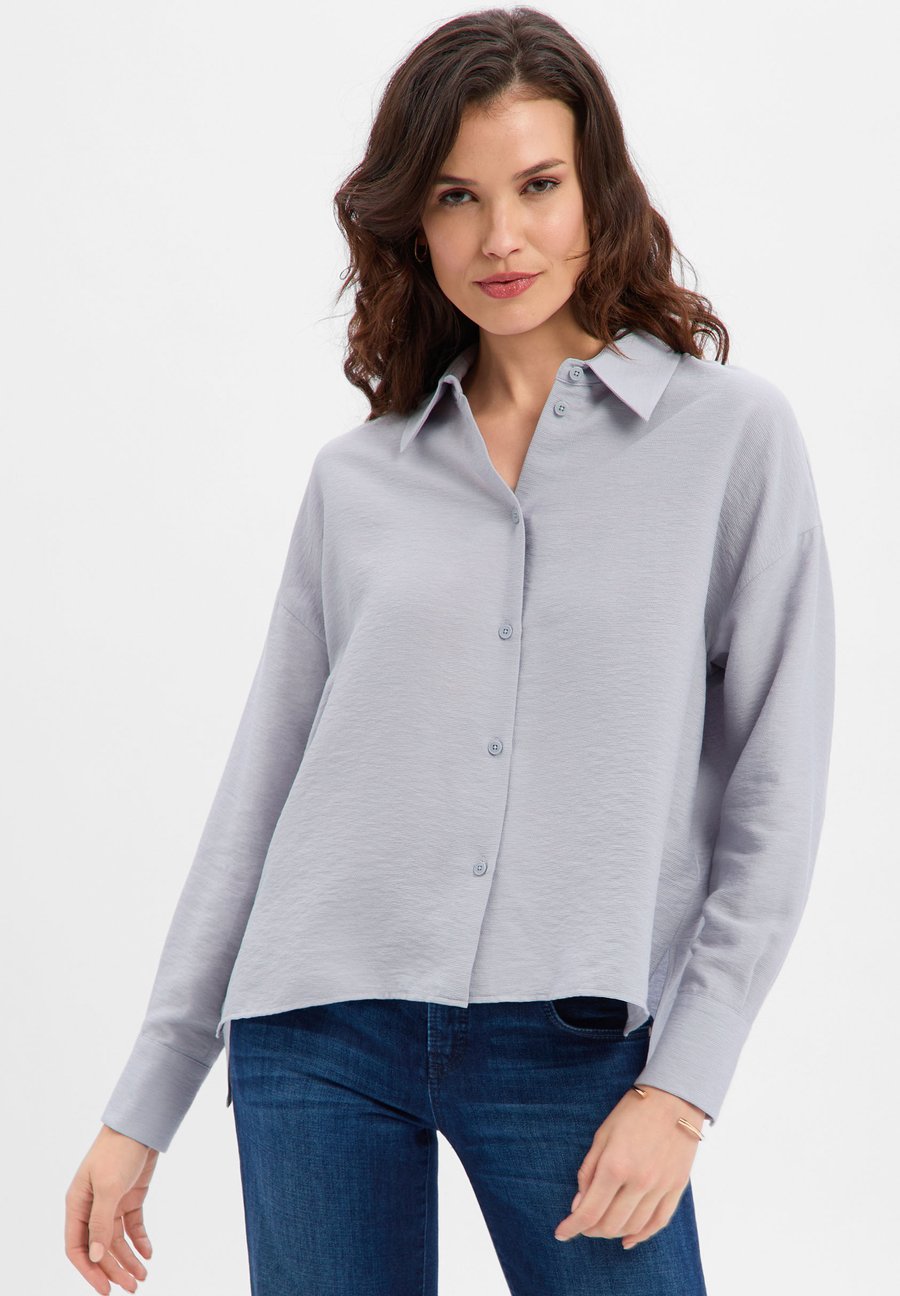 Блуза DRYKORN CLOELIA, Hellgrau/Light Grey
Блуза DRYKORN CLOELIA, Hellgrau/Light Grey