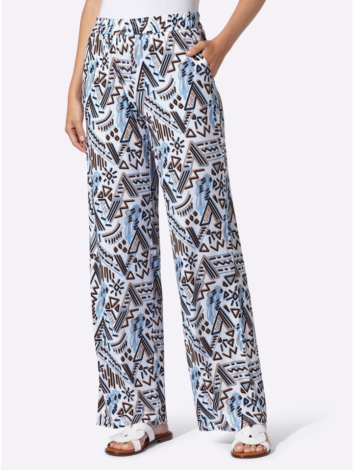 Трикотажные брюки с белым и голубым принтом Heine
Трикотажные брюки с белым и голубым принтом Heine