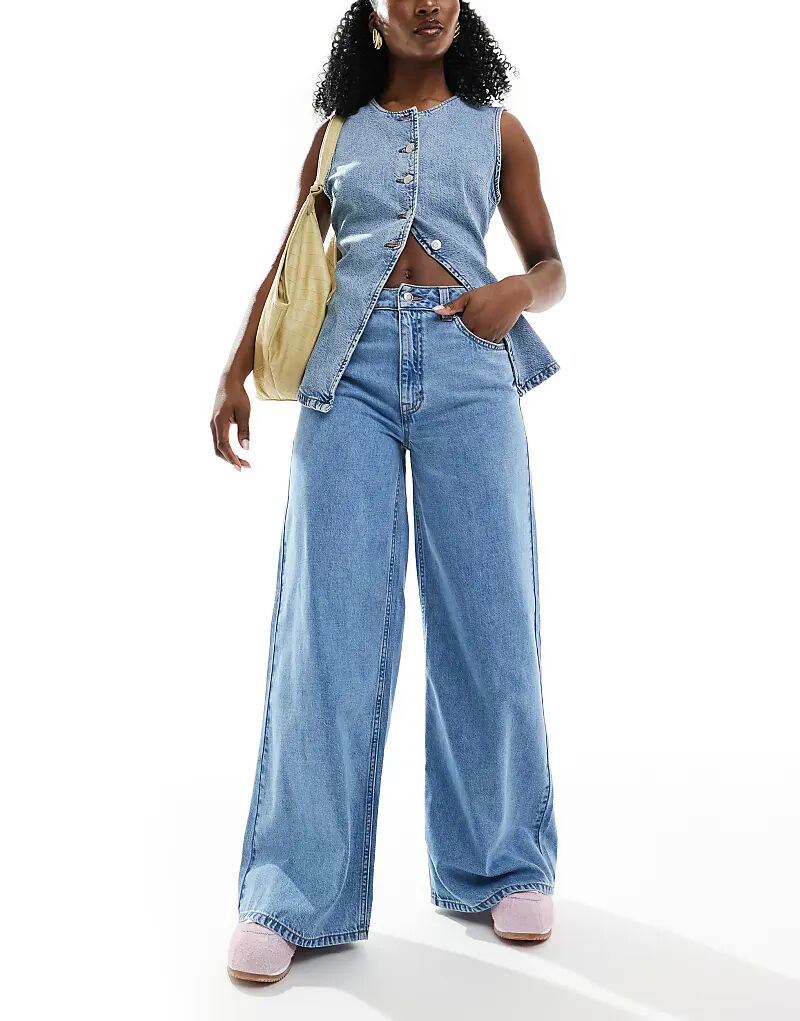 Джинсы ASOS DESIGN с высокой талией и широкими штанинами чистого синего цвета
Джинсы ASOS DESIGN с высокой талией и широкими штанинами чистого синего цвета