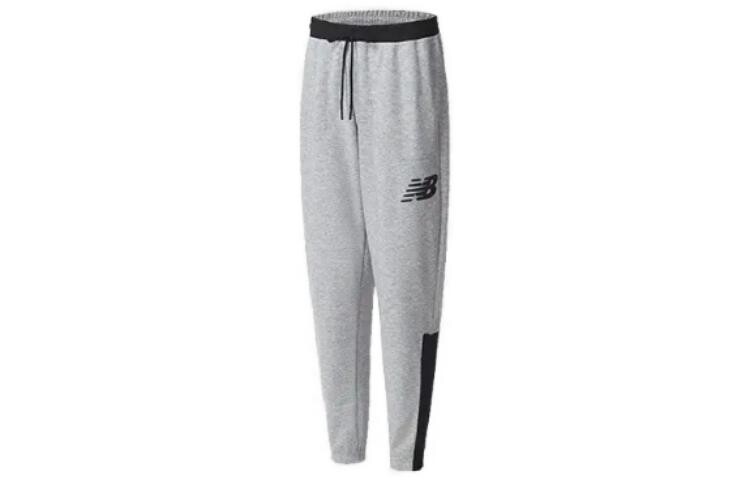 Спортивные брюки унисекс серые New Balance, серый
Спортивные брюки унисекс серые New Balance, серый