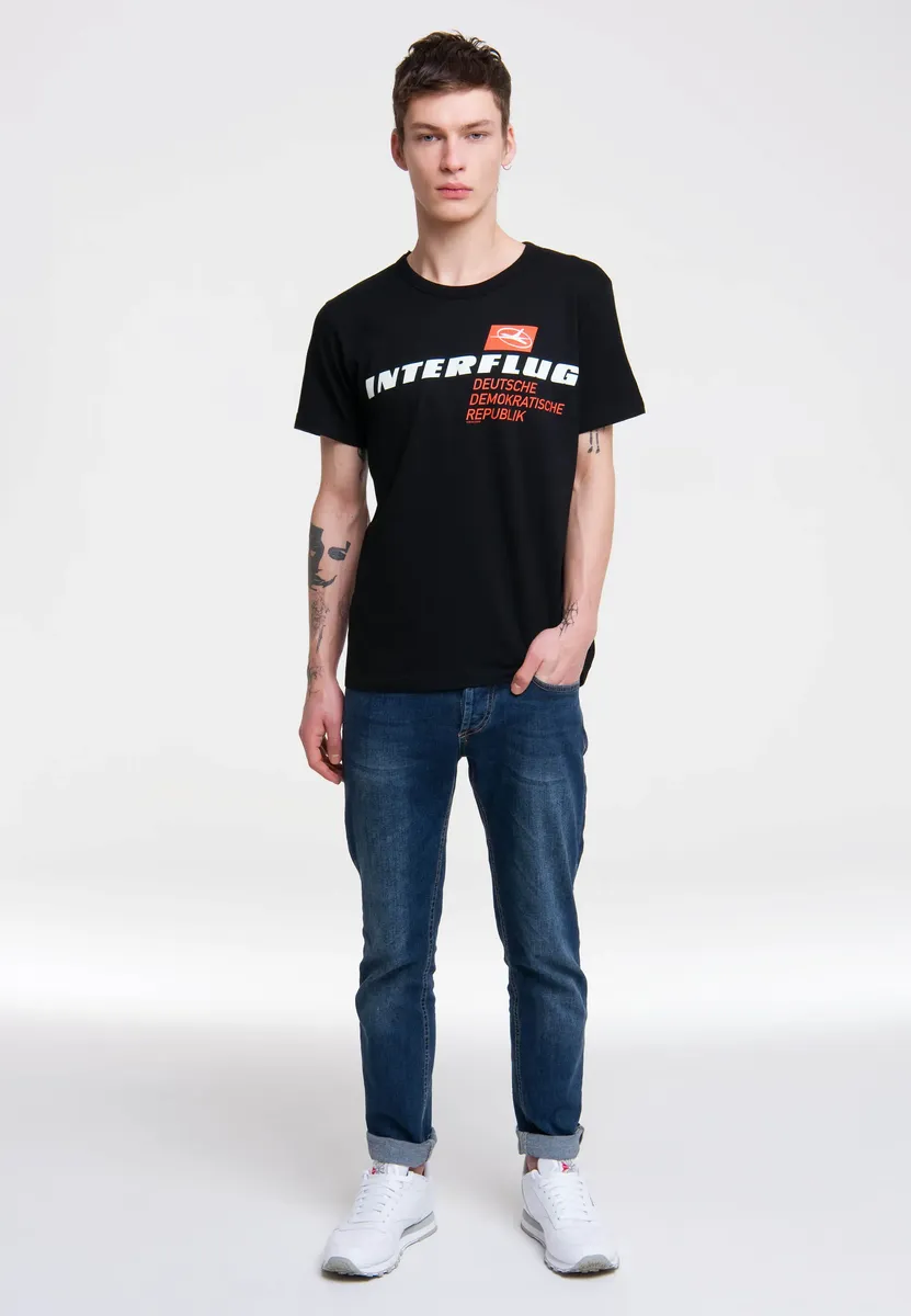 Logoshirt Футболка "Interflug DDR" с контрастным принтом, цвет Schwarz-Mehrfarbig
Logoshirt Футболка "Interflug DDR" с контрастным принтом, цвет Schwarz-Mehrfarbig