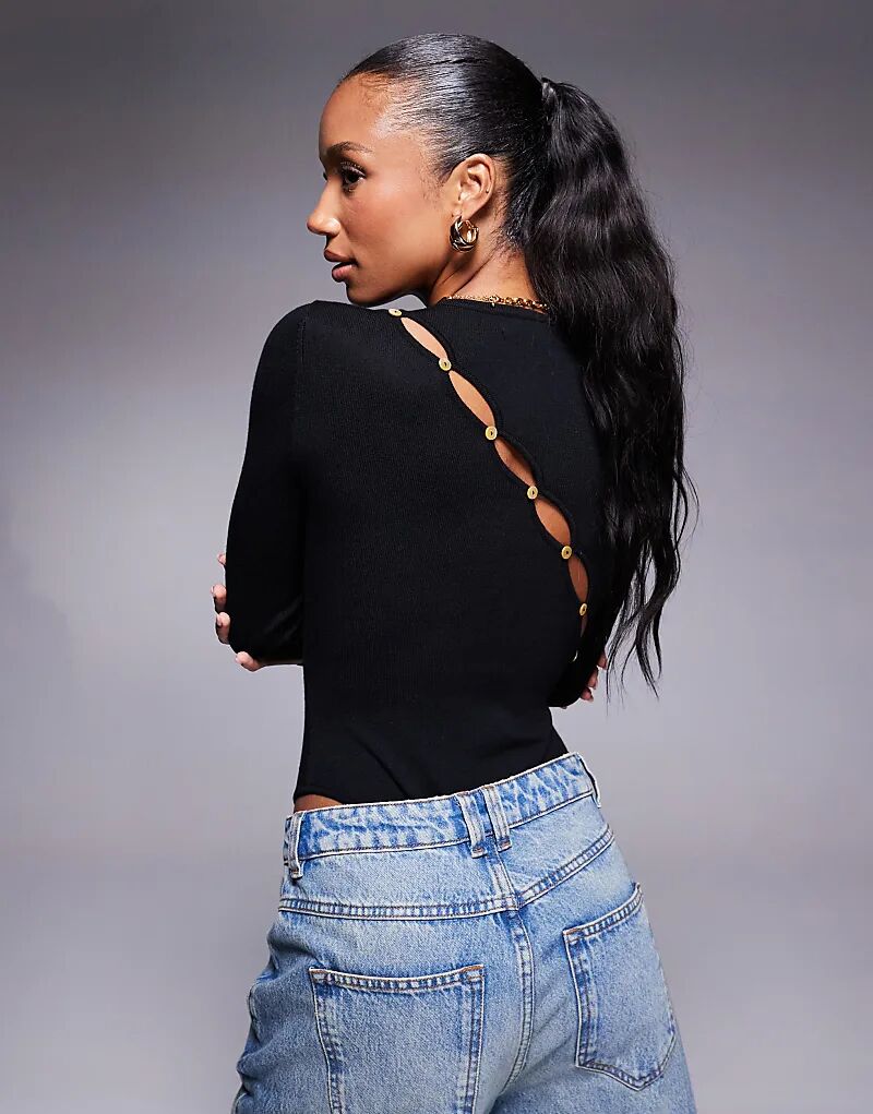 Эксклюзивный асимметричный трикотажный боди с длинными рукавами на пуговицах сзади черного цвета Kaiia
Эксклюзивный асимметричный трикотажный боди с длинными рукавами на пуговицах сзади черного цвета Kaiia