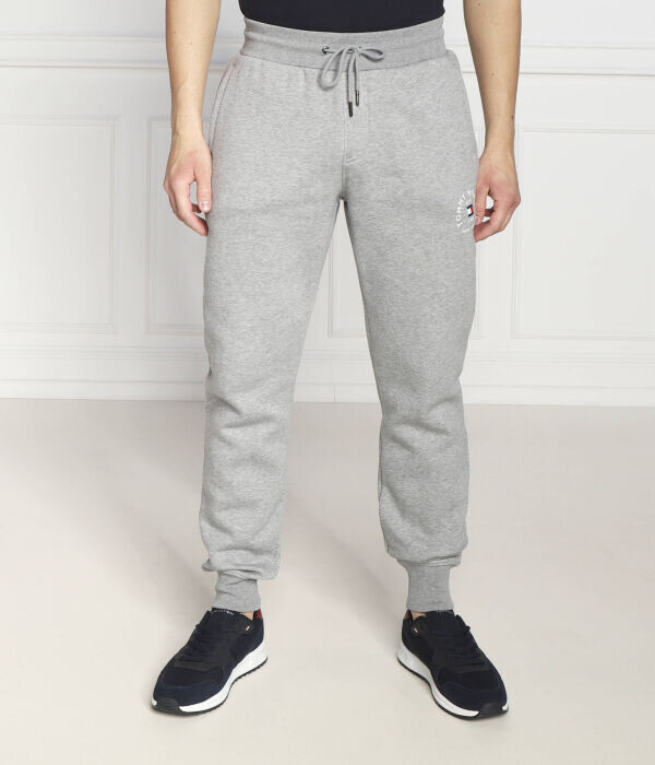 Брюки мужские Tommy Hilfiger Flag Arch спортивные джоггеры на кулиске, серый
Брюки мужские Tommy Hilfiger Flag Arch спортивные джоггеры на кулиске, серый