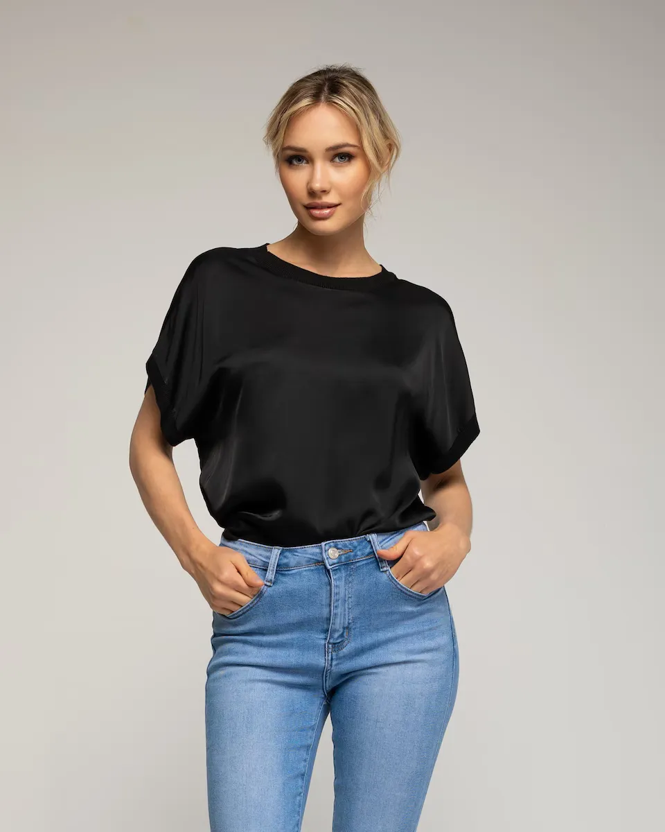 Женский шелковый топ свободного покроя с трикотажным подолом и вырезом горловины Tantra, черный
Женский шелковый топ свободного покроя с трикотажным подолом и вырезом горловины Tantra, черный