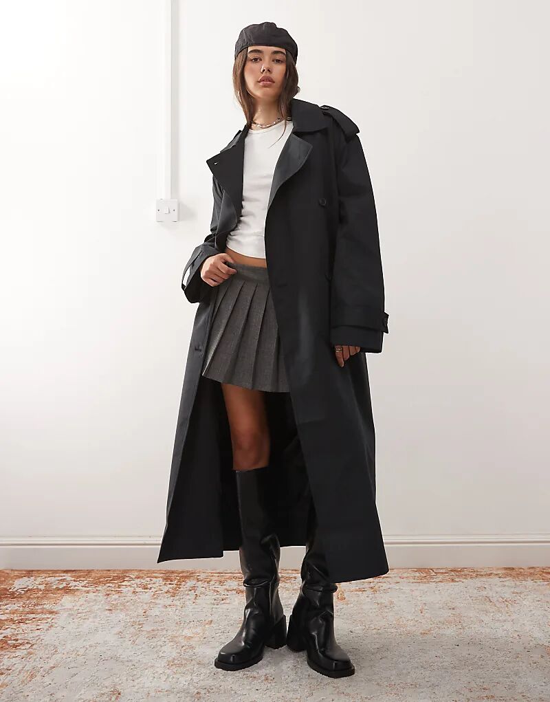 Свободный тренчкот Weekday черного цвета
Свободный тренчкот Weekday черного цвета