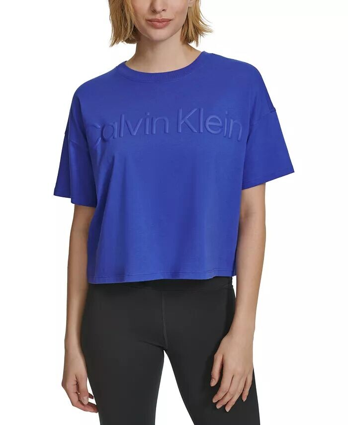 Женская хлопковая укороченная футболка с рельефным логотипом Calvin Klein, фиолетовый
Женская хлопковая укороченная футболка с рельефным логотипом Calvin Klein, фиолетовый